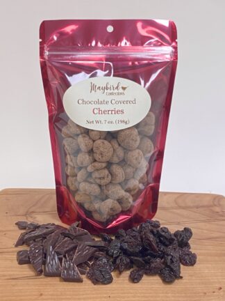 Chocolate covered cherries in a red bag